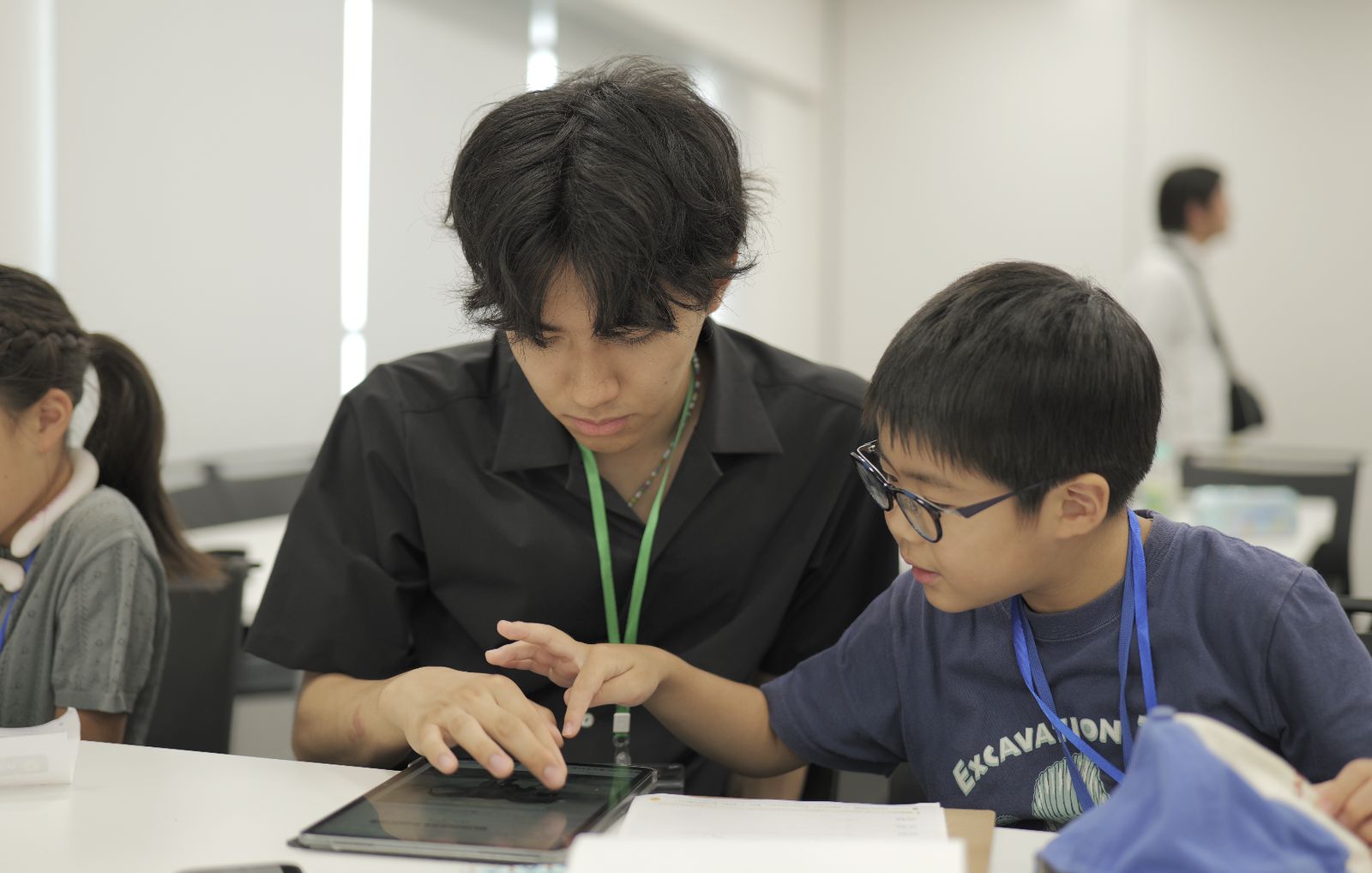 研究テーマを一緒に考えるメンターと参加者